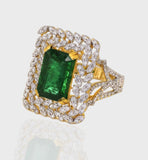 Emerald Octagon and Diamond Round Ring, Crafted to perfection, this exquisite piece harmonizes the allure of a striking octagonal emerald with the brilliance of surrounding diamond rounds.(PGDR0370)