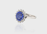 Diamond Ring featuring a captivating oval-cut Blue Sapphire at its heart, exuding timeless elegance and sophistication.(PGDR0439)