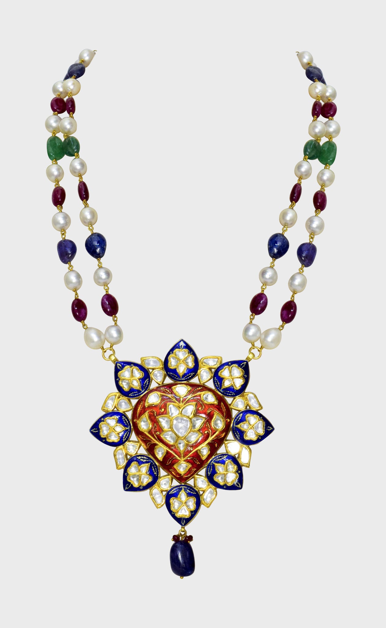 Red and blue Meena big pendant, adorned with dazzling diamond polki, strung alongside the rich hues of emerald, ruby, sapphire, and the lustrous elegance of South Sea pearls.(KMNE3406)