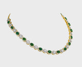 Enchant with elegance in our Emerald oval and diamond necklace and earring pair. Each piece exudes timeless sophistication and luxury.(GDNE0470)