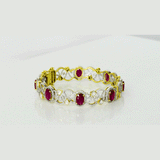 Grace meets heritage in this elegant bangle, crafted with sparkling Diamond Polki, brilliant round diamonds, and vibrant rubies. (GDB0256)