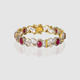 Grace meets heritage in this elegant bangle, crafted with sparkling Diamond Polki, brilliant round diamonds, and vibrant rubies. (GDB0256)