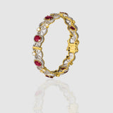 Grace meets heritage in this elegant bangle, crafted with sparkling Diamond Polki, brilliant round diamonds, and vibrant rubies. (GDB0256)