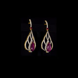Brilliant diamonds embrace vibrant pear-shaped rubies in an elegant openwork silhouette, creating timeless earrings with graceful contemporary sophistication.(GDE0480)