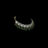This elegant necklace set features sparkling diamonds and rich green emeralds, beautifully paired with emerald maniya stringing. A perfect blend of classic charm and modern design, ideal for weddings, parties, or special occasions. (GDNE0512)
