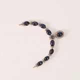 Elegant blue sapphire necklace adorned with brilliant round diamonds, blending timeless sophistication and everyday luxury in a graceful, refined design.(GDNE0513)