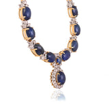 Elegant blue sapphire necklace adorned with brilliant round diamonds, blending timeless sophistication and everyday luxury in a graceful, refined design.(GDNE0513)