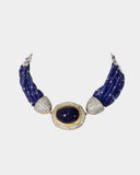 A regal choker-style necklace featuring an oval sapphire cabochon with diamonds, strung with sapphire beads and luminous pearls for a refined, timeless statement. (GDNE0518)
