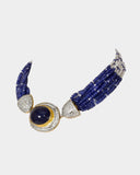 A regal choker-style necklace featuring an oval sapphire cabochon with diamonds, strung with sapphire beads and luminous pearls for a refined, timeless statement. (GDNE0518)
