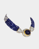 A regal choker-style necklace featuring an oval sapphire cabochon with diamonds, strung with sapphire beads and luminous pearls for a refined, timeless statement. (GDNE0518)