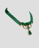 A striking necklace showcasing an octagon emerald centre framed by round diamonds, strung with emerald beads for rich colour, refined elegance, and timeless luxury. (GDNE0528)