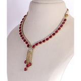 Ruby Cascade Diamond Necklace Set Brilliant oval rubies paired with sparkling diamonds create a graceful necklace set, complemented by elegant drop earrings for timeless sophistication and refined luxury.(GDNE0541)