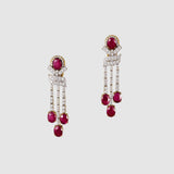 Ruby Cascade Diamond Necklace Set Brilliant oval rubies paired with sparkling diamonds create a graceful necklace set, complemented by elegant drop earrings for timeless sophistication and refined luxury.(GDNE0541)