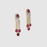 Ruby Cascade Diamond Necklace Set Brilliant oval rubies paired with sparkling diamonds create a graceful necklace set, complemented by elegant drop earrings for timeless sophistication and refined luxury.(GDNE0541)