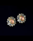 A beautifully structured choker featuring blush rose quartz centers, framed with polki and round diamonds, paired with matching statement earrings. (GDNE0542)