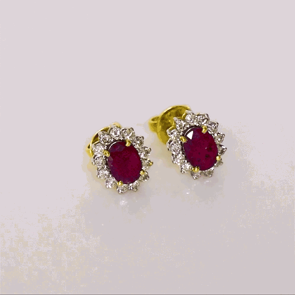 Ruby & Diamond Stud Earrings Classic ruby and diamond stud earrings showcasing vivid rubies surrounded by brilliant diamonds, perfect for adding timeless luxury to every look.(GDNE0547)