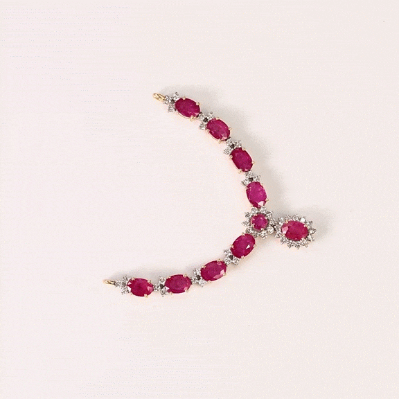 Delicate oval rubies framed with brilliant diamonds create a classic necklace that celebrates elegance in every detail.(GDNE0547)