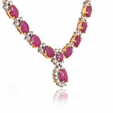 Delicate oval rubies framed with brilliant diamonds create a classic necklace that celebrates elegance in every detail.(GDNE0547)