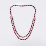 Ruby Radiance Double-Line Necklace Set A captivating double-line necklace showcasing vibrant oval rubies and sparkling diamonds, paired with elegant matching earrings for timeless glamour, sophistication, and luxurious brilliance.(GDNE0548)