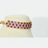 Ruby, Diamond & Pearl Choker An exquisite ruby, diamond, and pearl choker blending royal craftsmanship with contemporary elegance, creating a striking statement for every festive occasion.(GDNE0550)
