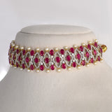 Ruby, Diamond & Pearl Choker An exquisite ruby, diamond, and pearl choker blending royal craftsmanship with contemporary elegance, creating a striking statement for every festive occasion.(GDNE0550)