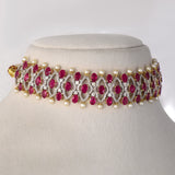 Ruby, Diamond & Pearl Choker An exquisite ruby, diamond, and pearl choker blending royal craftsmanship with contemporary elegance, creating a striking statement for every festive occasion.(GDNE0550)