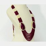 Regal Ruby Beaded Statement Necklace A magnificent statement necklace featuring oversized ruby centrepieces framed with dazzling diamonds, gracefully strung with ruby beads and luminous pearls for unmatched royal elegance.(GDNE0552)