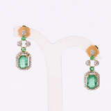 A stunning blend of emerald-cut emeralds and sparkling diamonds, this elegant necklace set is crafted to make every occasion unforgettable.(GDNE0553)