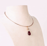 Elegant in every detail, this diamond and pink tourmaline pendant set with a gold chain is designed to shine on every occasion.(GDNE0555)