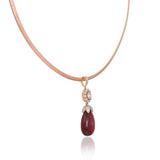 Elegant in every detail, this diamond and pink tourmaline pendant set with a gold chain is designed to shine on every occasion.(GDNE0555)