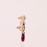 Elegant in every detail, this diamond and pink tourmaline pendant set with a gold chain is designed to shine on every occasion.(GDNE0555)