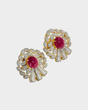 An exquisite pendant and earring set featuring red oval ruby cabochons accented with brilliant diamonds. Offering timeless elegance, rich colour, and refined luxury for a striking statement. (GDPE0403)