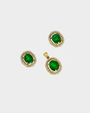 Classic pendant and earring set with oval emeralds and round diamonds, offering graceful elegance and timeless appeal. (GDPE0415 & GDE0475)