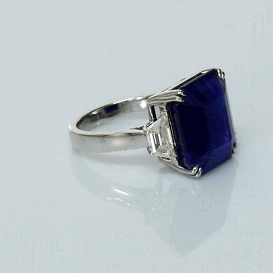 A mesmerizing deep blue sapphire ring adorned with sparkling diamonds, crafted to reflect timeless elegance, luxury, and sophistication for every special occasion.(GDR0350)