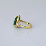 Pear-cut emerald ring with sparkling diamonds, designed for timeless elegance, luxury, and everyday sophistication.(KCA-8)