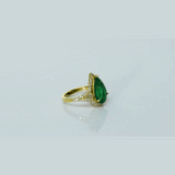 Pear-cut emerald ring with sparkling diamonds, designed for timeless elegance, luxury, and everyday sophistication.(KCA-8)