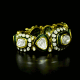 Royal Polki Flexible Bracelet A luxurious flexible bracelet showcasing oversized diamond polki, accented with shimmering polki details and rich green enamel for timeless royal elegance and charm.(KMBR0153)