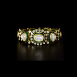 Royal Polki Flexible Bracelet A luxurious flexible bracelet showcasing oversized diamond polki, accented with shimmering polki details and rich green enamel for timeless royal elegance and charm.(KMBR0153)