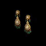 Royal Polki Bridal Necklace Set A magnificent diamond polki necklace featuring ruby detailing, emerald bead hangings, and matching statement earrings—crafted for timeless bridal elegance with regal heritage appeal.(KMNE3643)