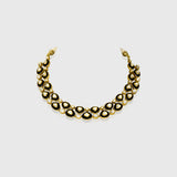 This elegant necklace features sparkling diamond Polki paired with bold black onyx, blending traditional charm with modern style. Handcrafted with precision, it's perfect for festive occasions or evening wear.(WDN1219) + (KME2448)
