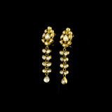 Exquisite traditional Polki diamond earrings crafted in 18K gold, featuring elegant dangling design with intricate meenakari artwork at the back for timeless royal charm.(KME2471)