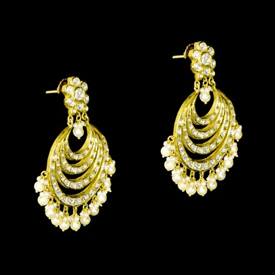 Elegant white chandbali earrings with sparkling Polki diamonds and pearl drops, designed to bring graceful traditional charm and timeless beauty to every occasion.(KME2522)