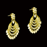 Elegant white chandbali earrings with sparkling Polki diamonds and pearl drops, designed to bring graceful traditional charm and timeless beauty to every occasion.(KME2522)