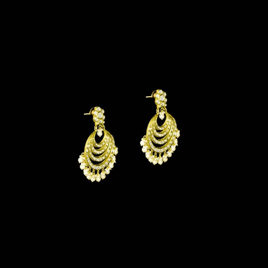 Elegant white chandbali earrings with sparkling Polki diamonds and pearl drops, designed to bring graceful traditional charm and timeless beauty to every occasion.(KME2522)