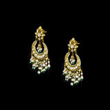 Classic white chandbali earrings adorned with shimmering Polki diamonds and delicate pearl detailing, crafted to add graceful elegance and festive beauty to your traditional look. (KME2523)