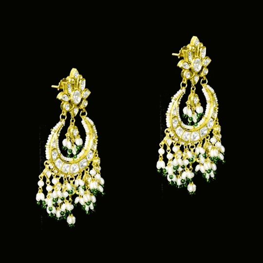 Classic white chandbali earrings adorned with shimmering Polki diamonds and delicate pearl detailing, crafted to add graceful elegance and festive beauty to your traditional look. (KME2523)
