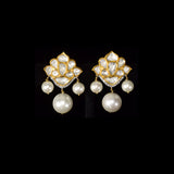 Gracefully crafted with radiant Diamond Polki, sparkling round diamonds, and South Sea pearl drops, these earrings exude refined luxury and effortless charm.(KME2531)