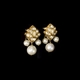 Gracefully crafted with radiant Diamond Polki, sparkling round diamonds, and South Sea pearl drops, these earrings exude refined luxury and effortless charm.(KME2531)