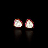 Fusion Diamond Polki & Ruby Tops A bold Diamond Polki centre embraced by vibrant ruby accents, these fusion-style tops beautifully combine timeless heritage with contemporary elegance for every occasion.(KME2533)