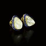 Diamond Polki & Blue Sapphire Tops Elegant Diamond Polki tops surrounded by vibrant blue sapphires, blending timeless heritage, refined craftsmanship, and effortless sophistication for every occasion.(KME2534)
